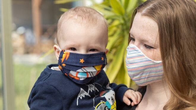 Mom and toddler wearing face mask