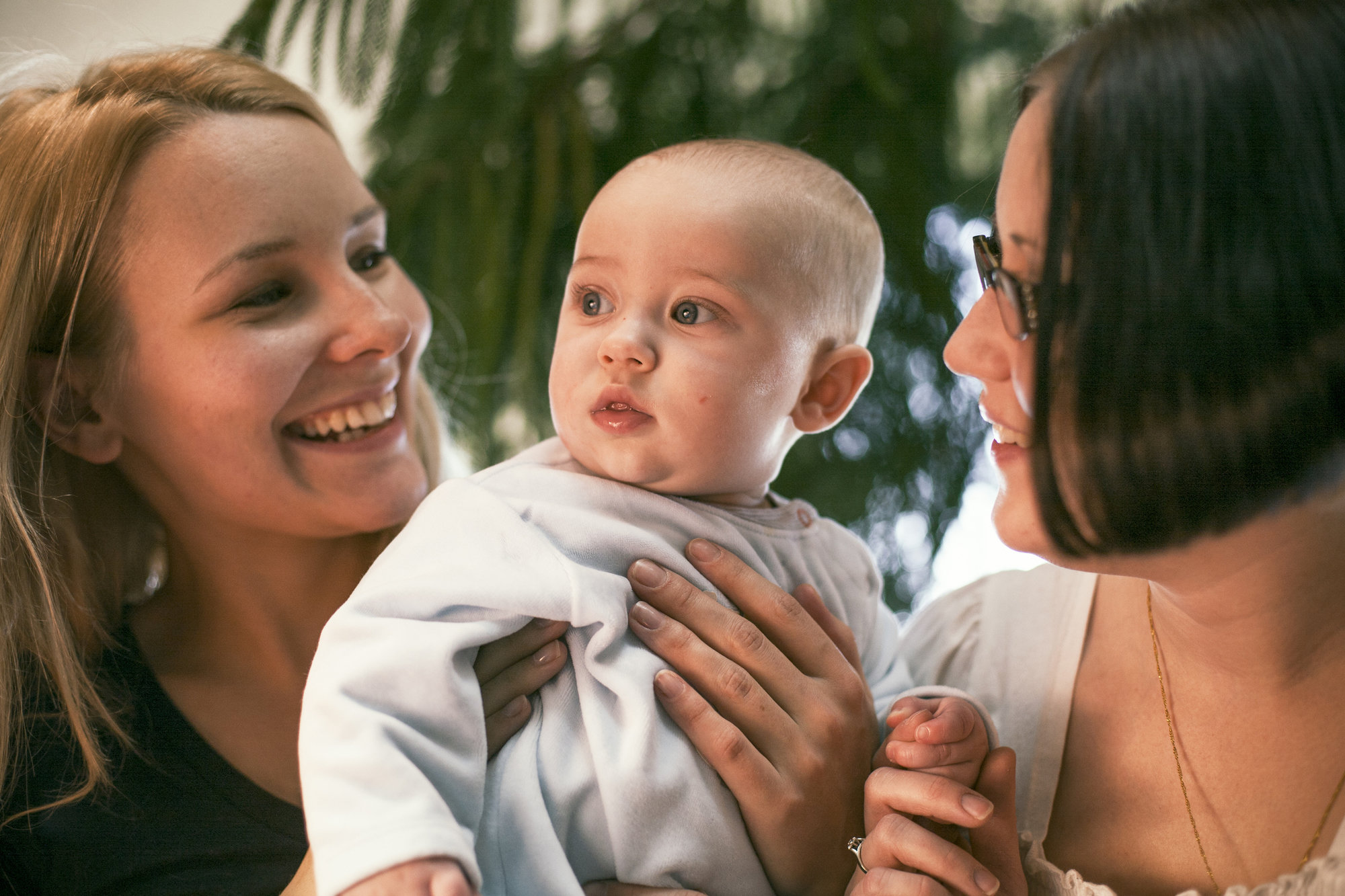 two women and a baby