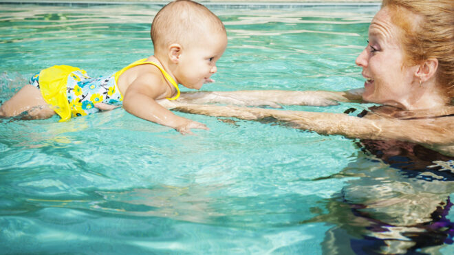 Mom at swimming class with baby
