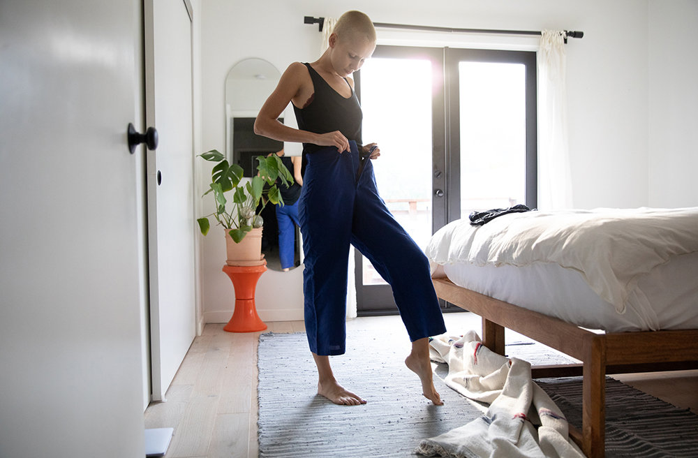 Woman getting dressed