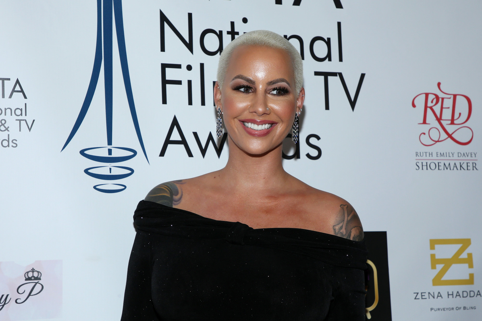 Amber Rose forehead tattoo