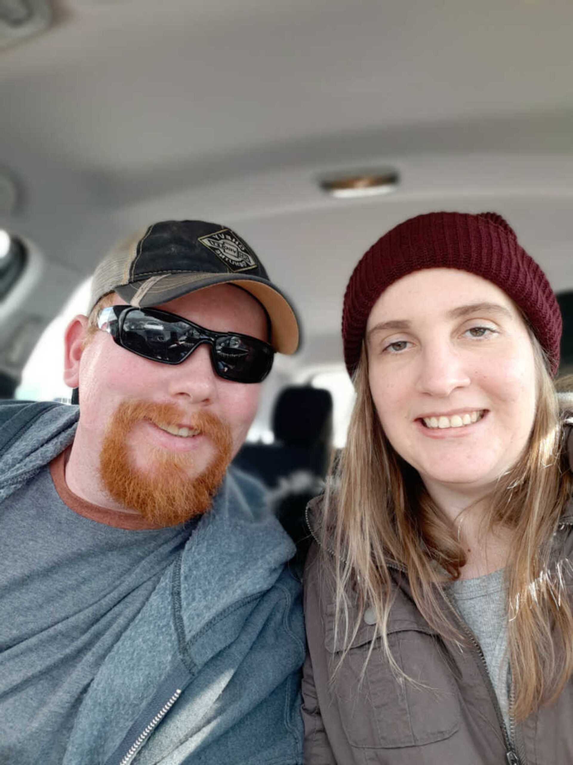 husband-and-wife-sitting-in-car-900x1200-1.jpg