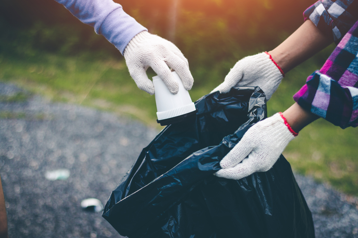 Group women volunteer help garbage collection charity environment.