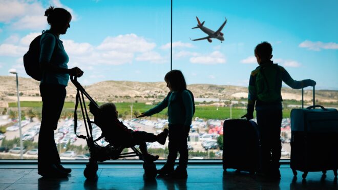 mom at airport with children