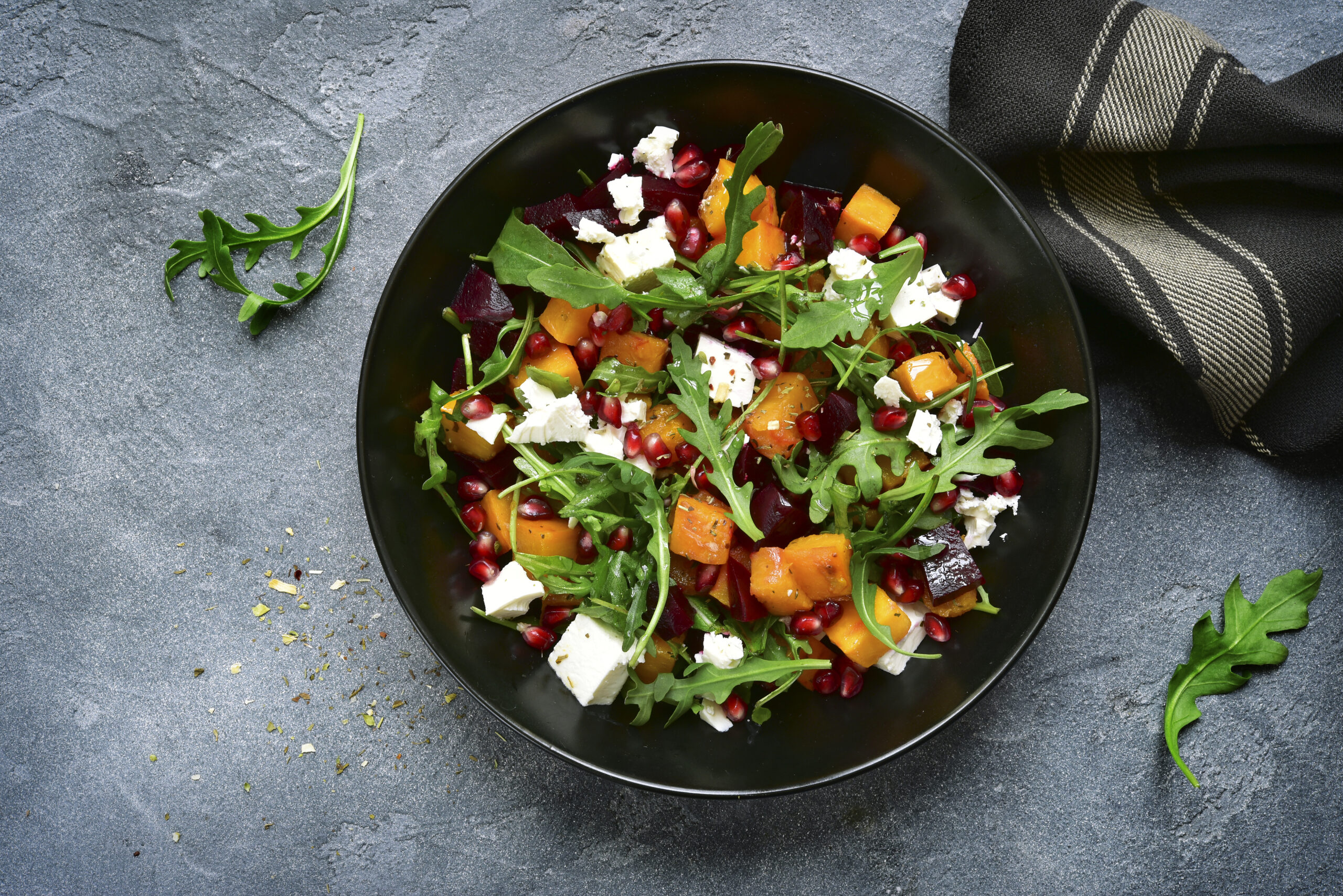 Pumpkin salad with beetroot, arugula and feta cheese