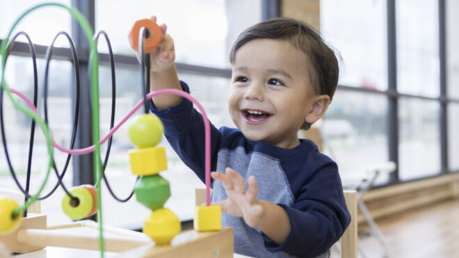 toddler boy playing