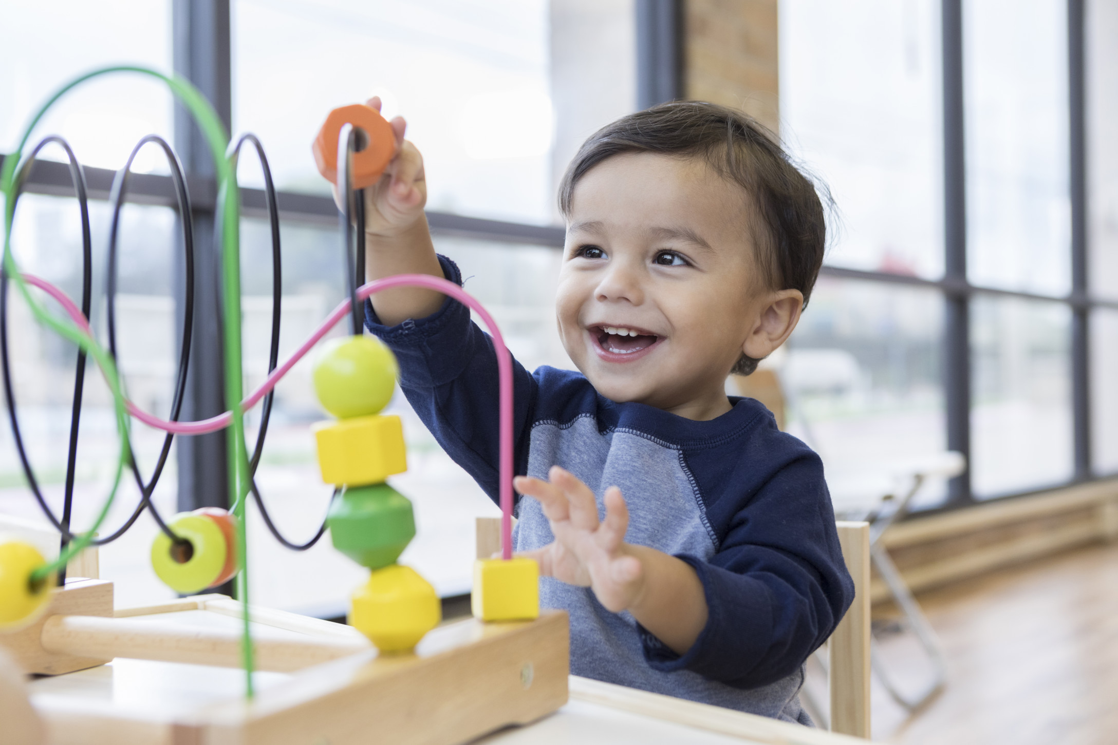 toddler boy playing