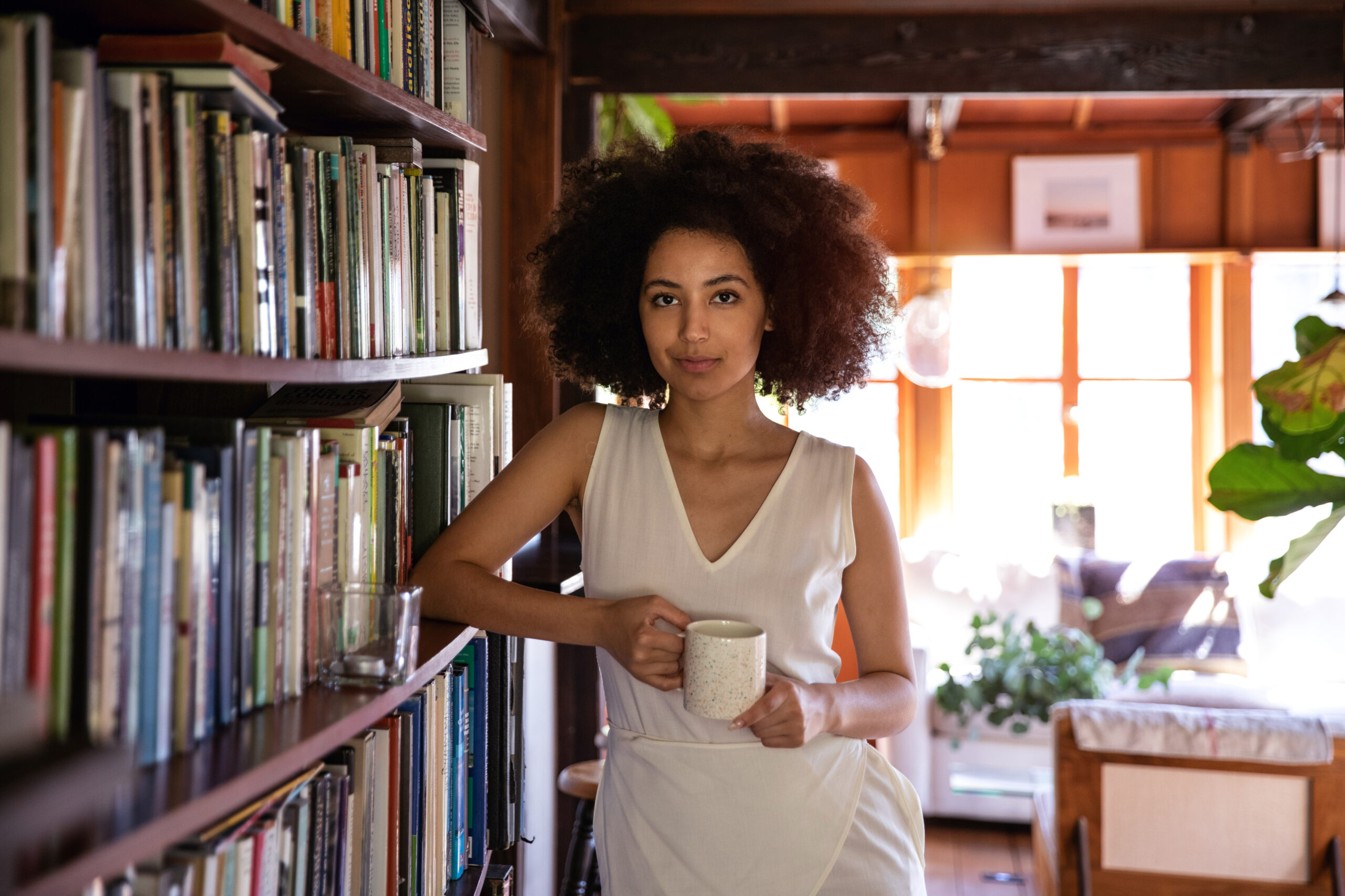 Young woman spending a relaxing day in her beautiful home