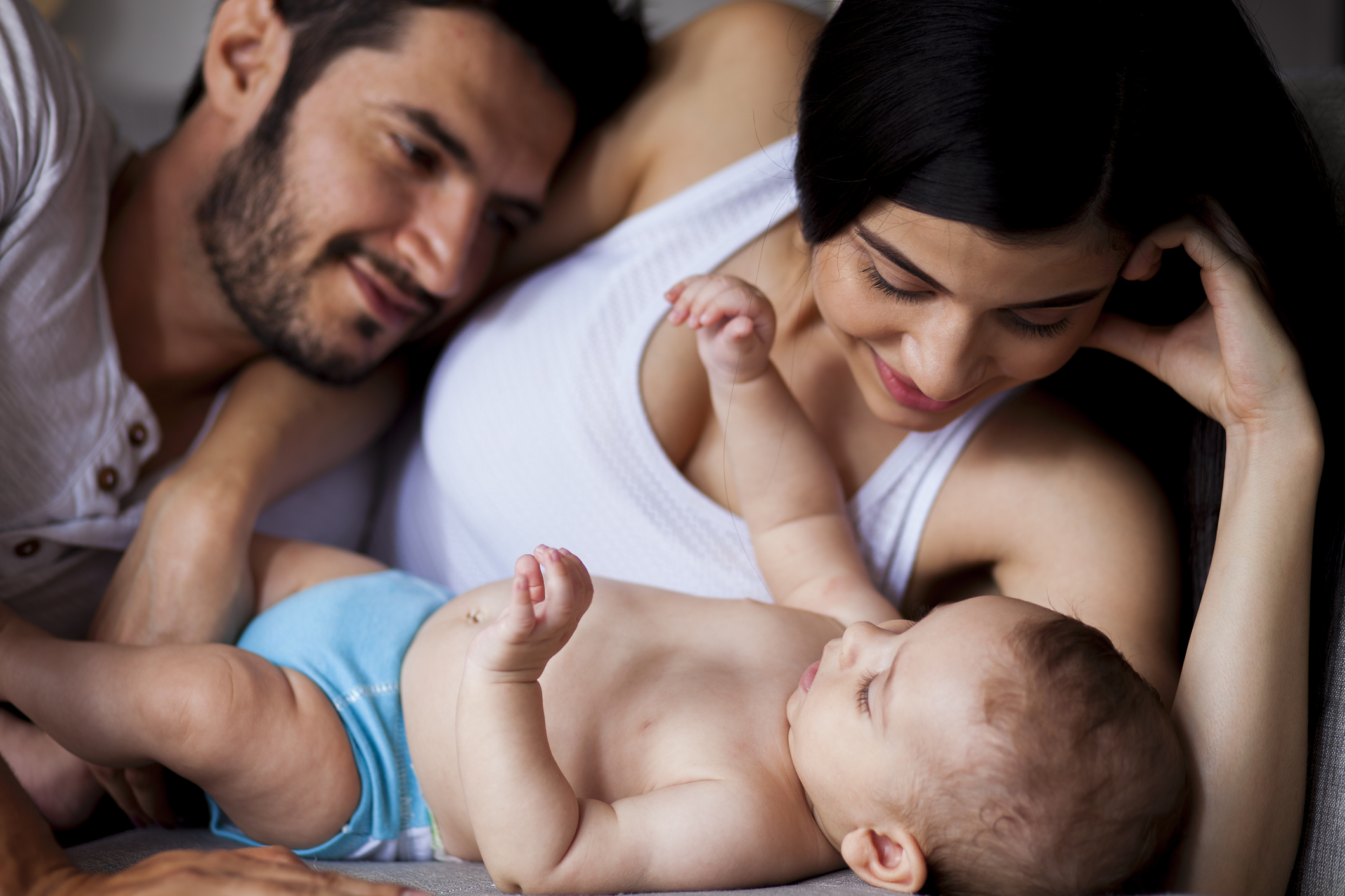 Parents in love with their little baby