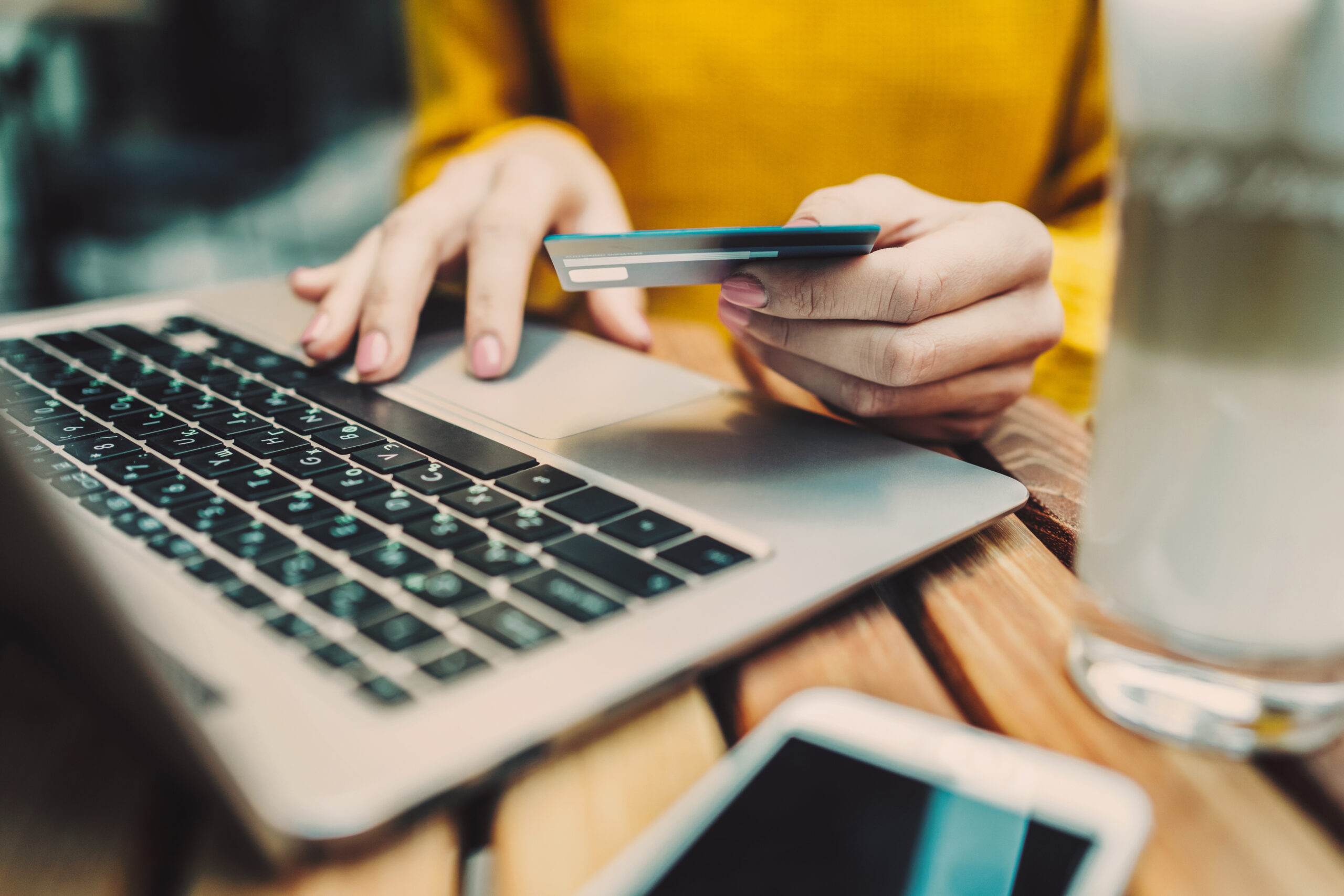 woman holding credit card