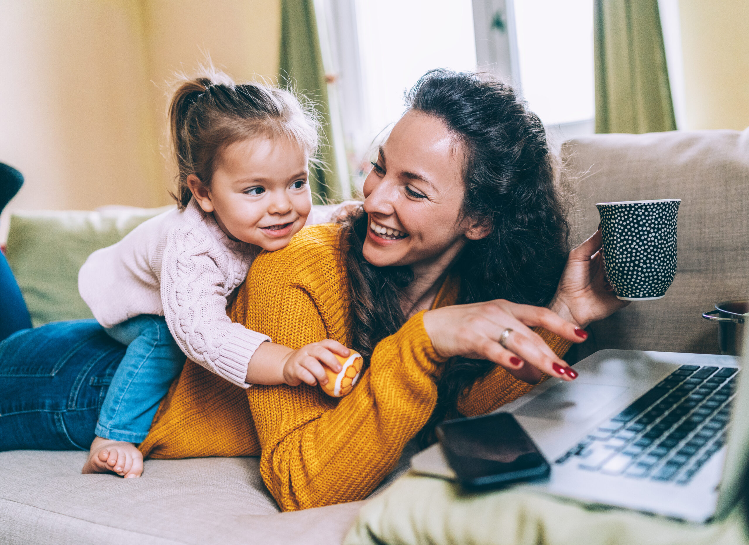 Mother and daughter Having fun online