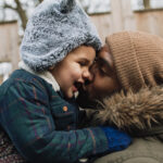 Father and son in winter