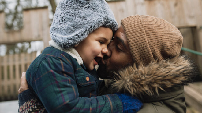 Father and son in winter