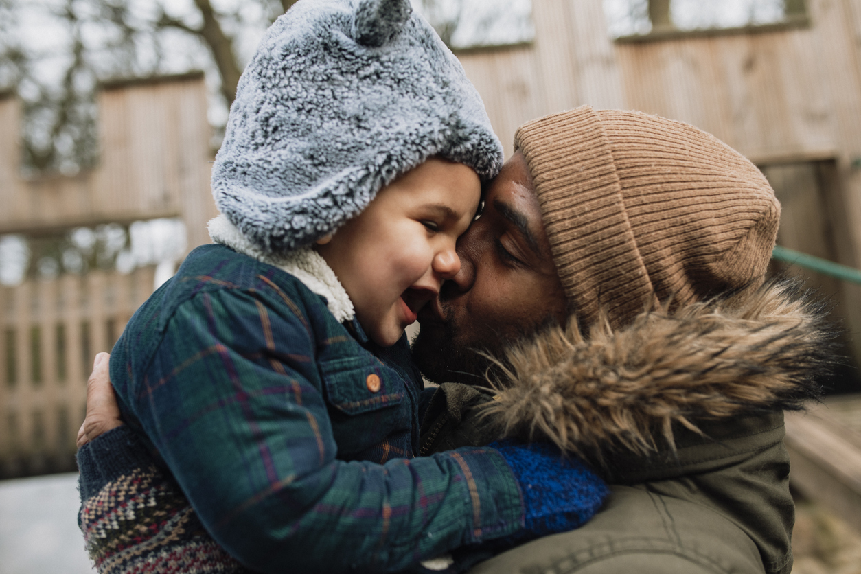 Father and son in winter