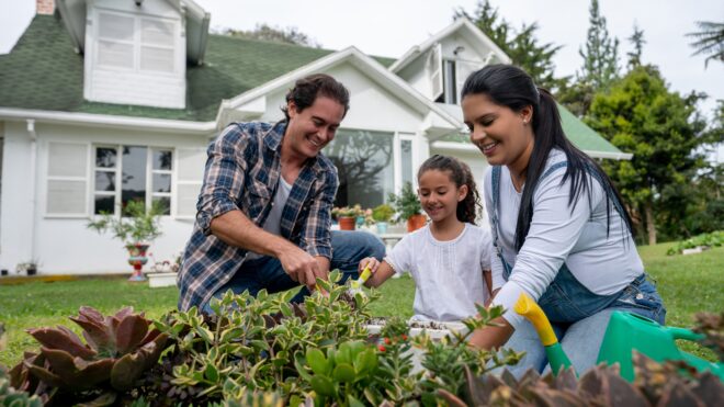 family doing lawn care