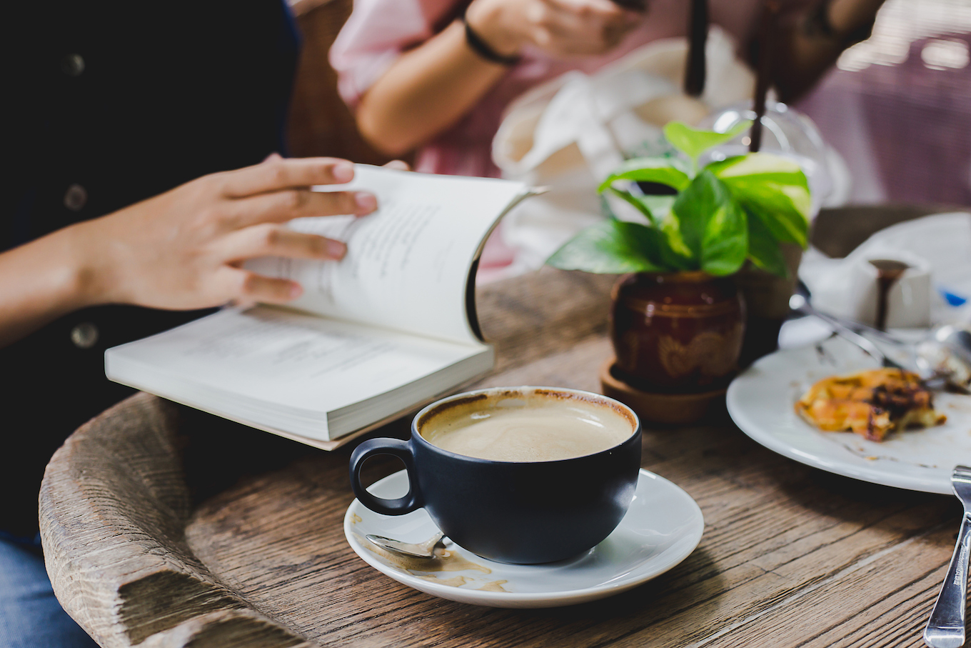 Lifestyle of student are relaxing at coffee shop on holiday.