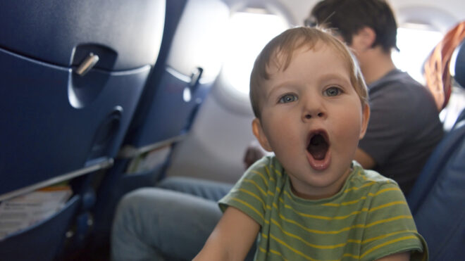 little boy on an airplane