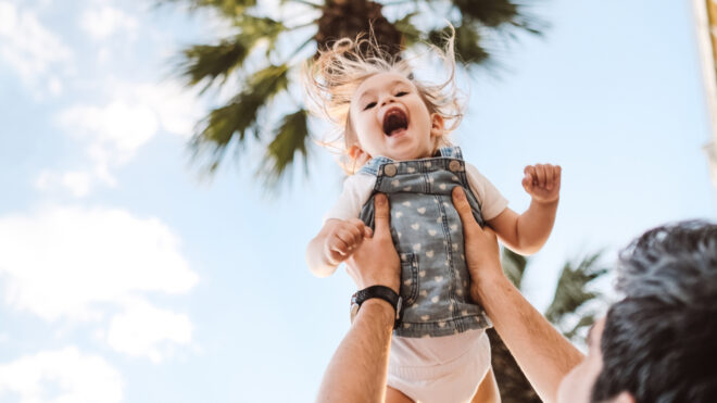 holding toddler
