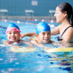 Kids swimming in a pool