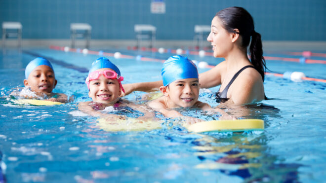 Kids swimming in a pool