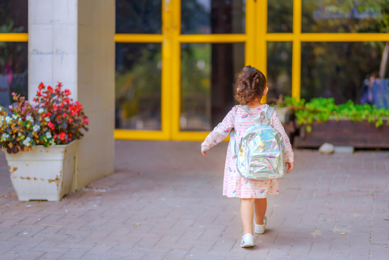 Girl At School Yard On First Day In September.