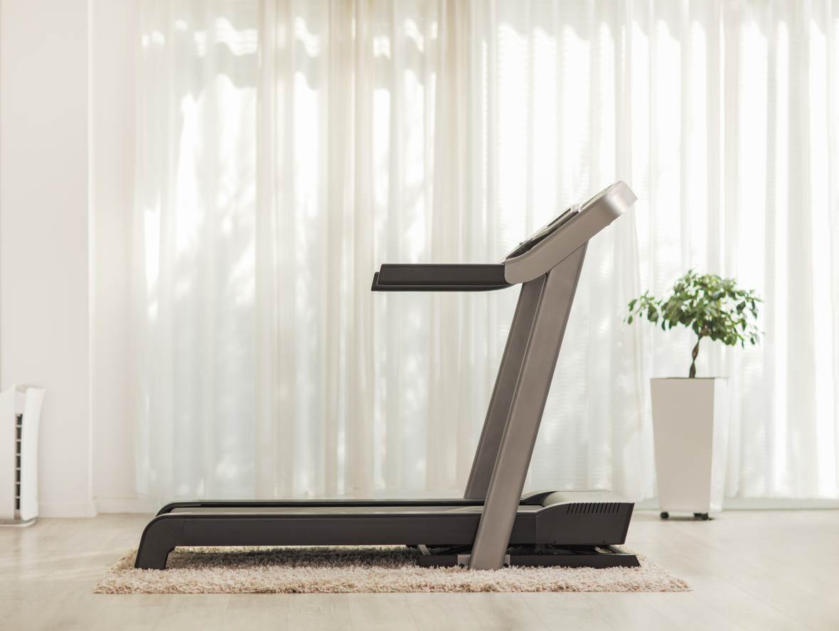 Professional modern treadmill at home