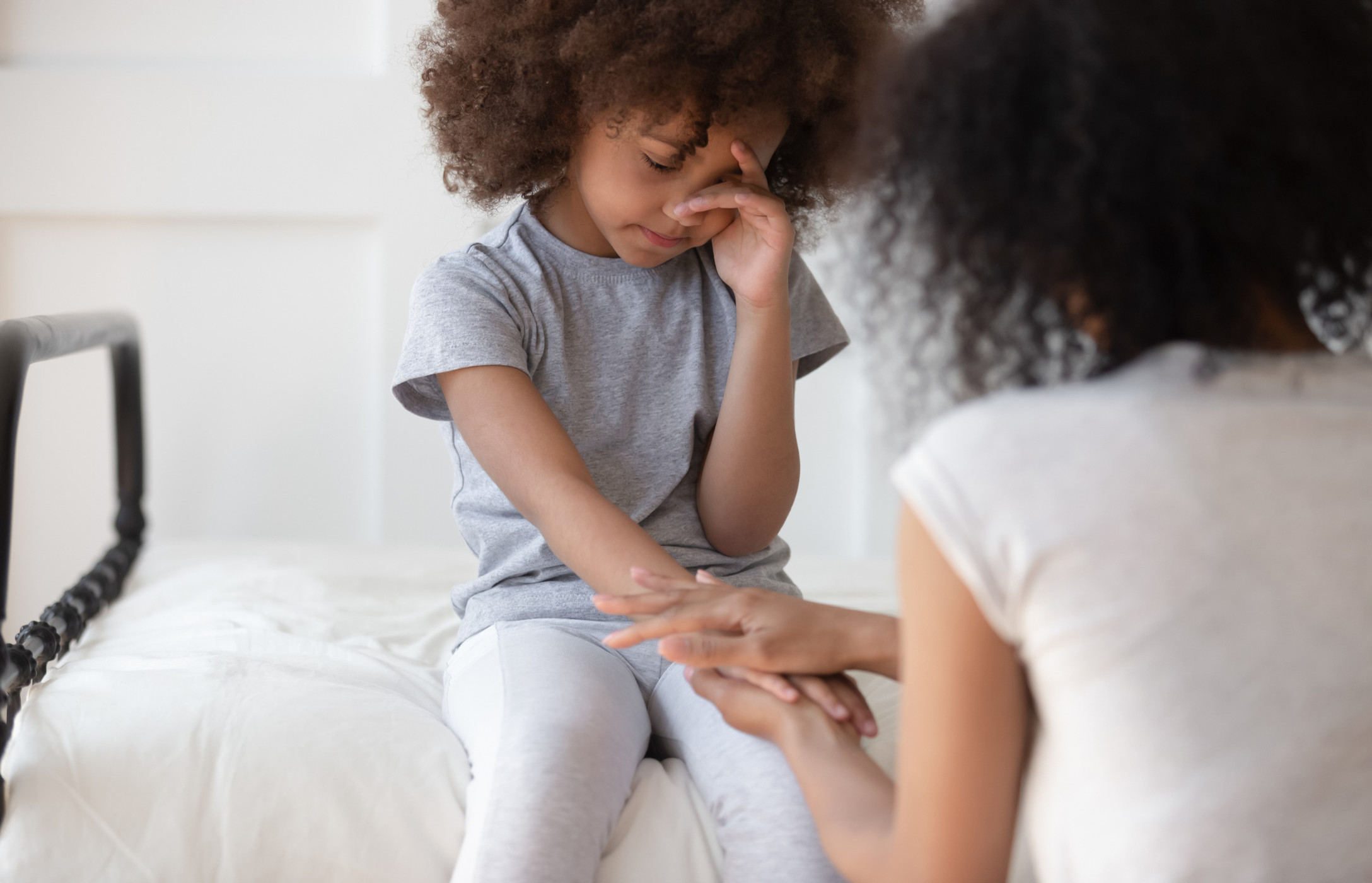 Mom comforting child