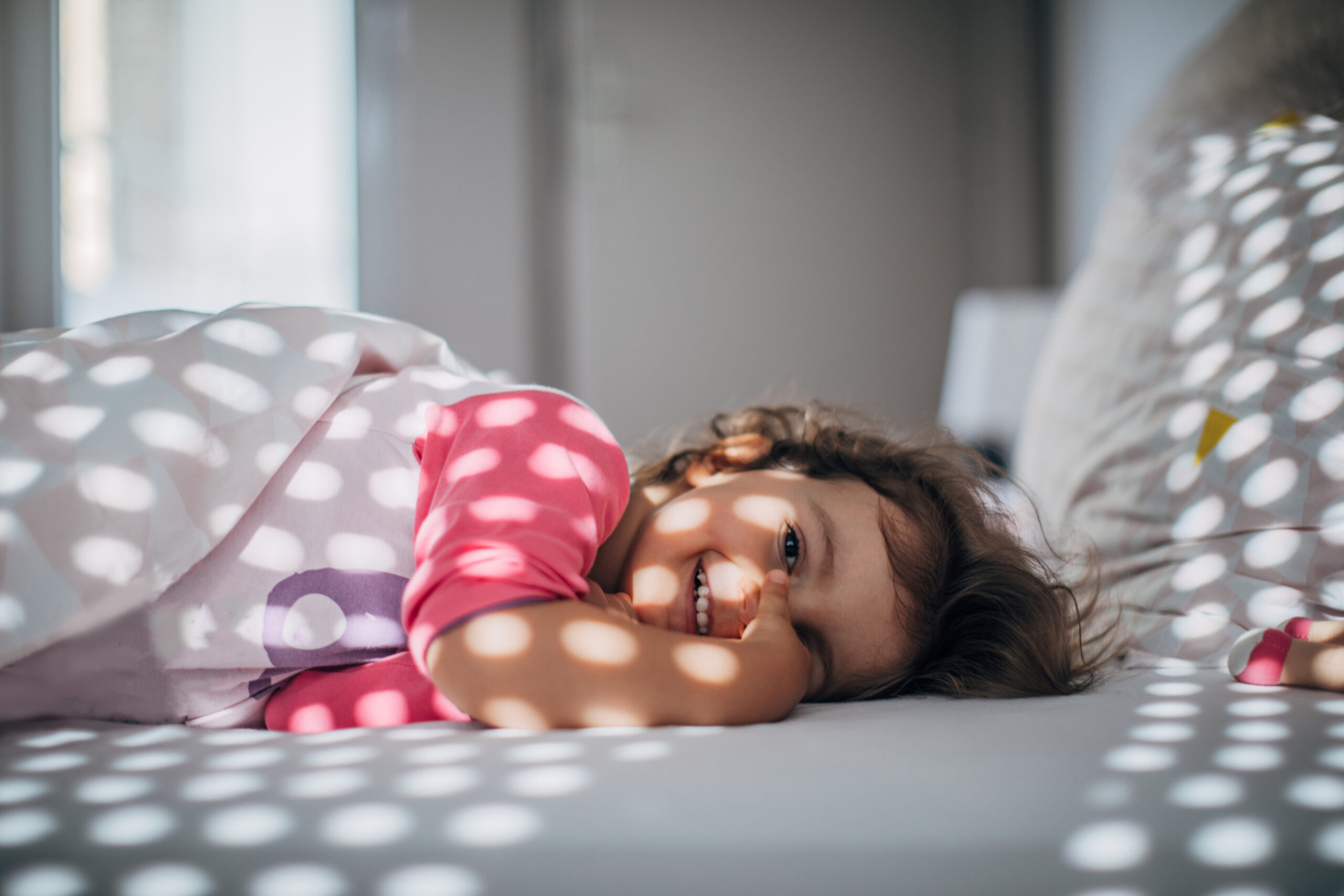 Cute girl waking up