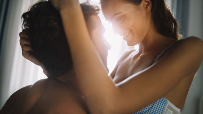 man and woman being intimate