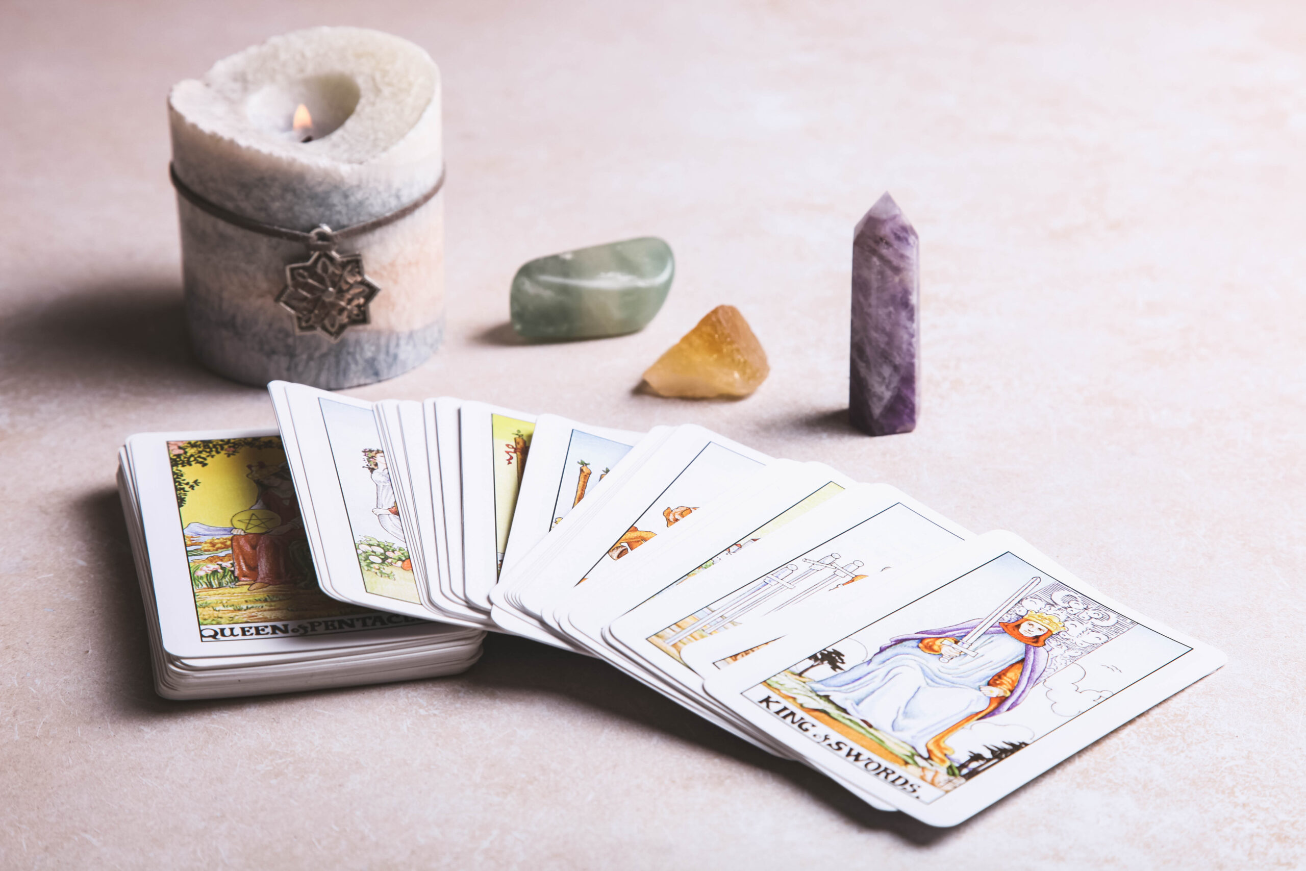 Fortune-telling tarot cards and mineral stones