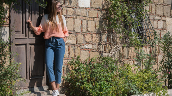 woman standing by door