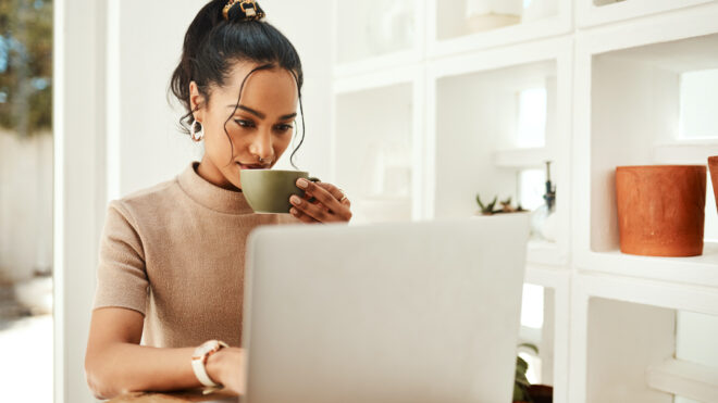 Woman looking at laptop