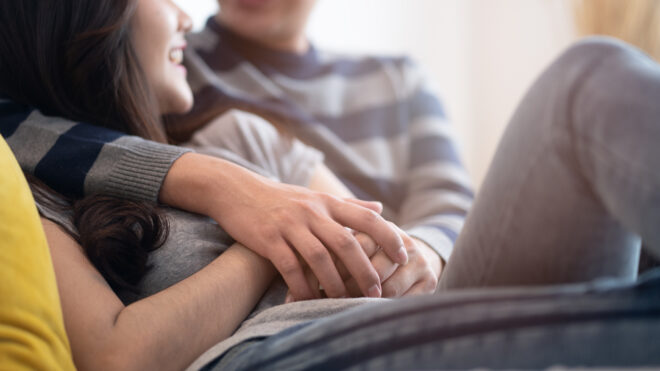 Couple holding hands