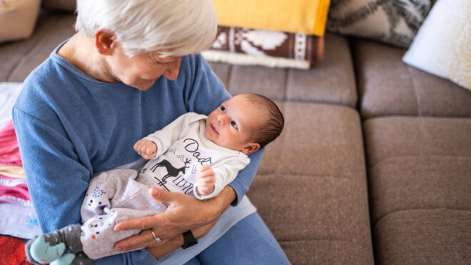 Grandmother holding baby