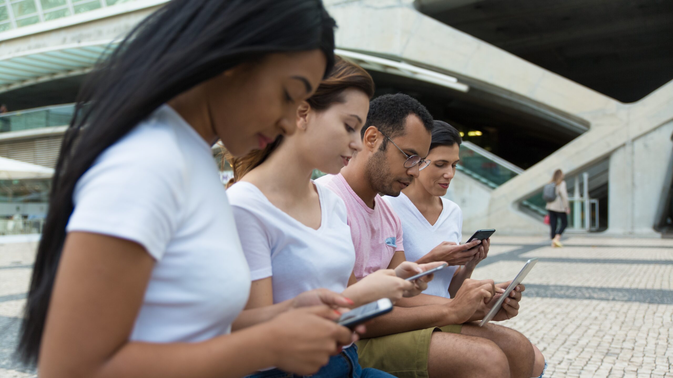 Group of teens texting