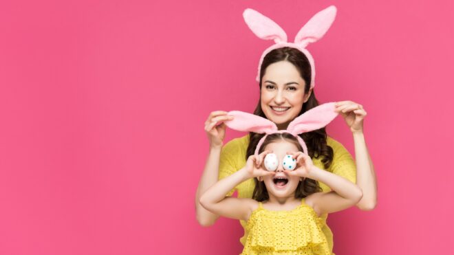 mom and child wearing bunny ears