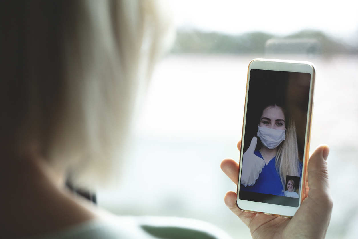 Young woman connecting with her family during quarantine