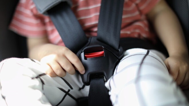 child in a car seat