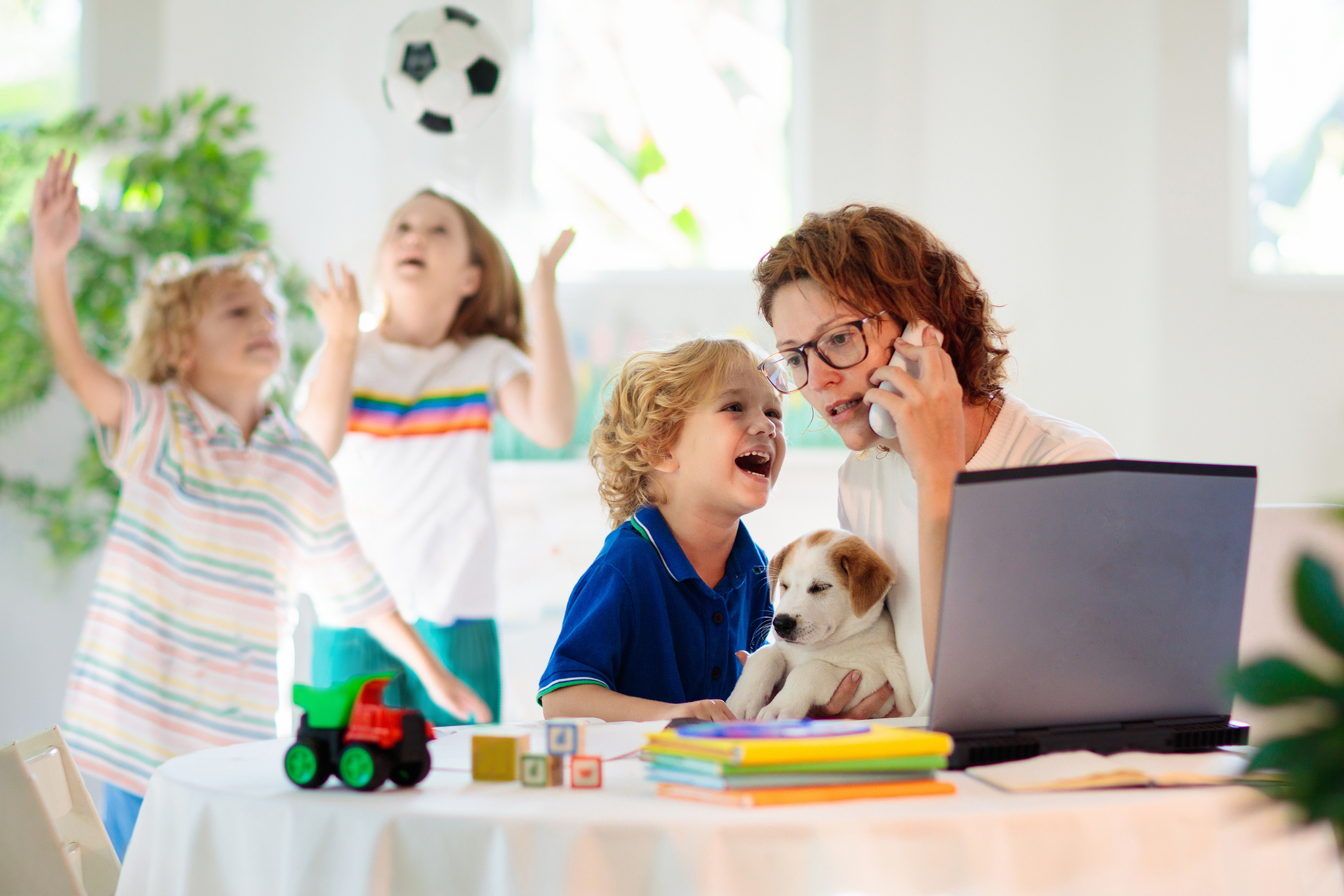Mother working from home with kids. Quarantine.