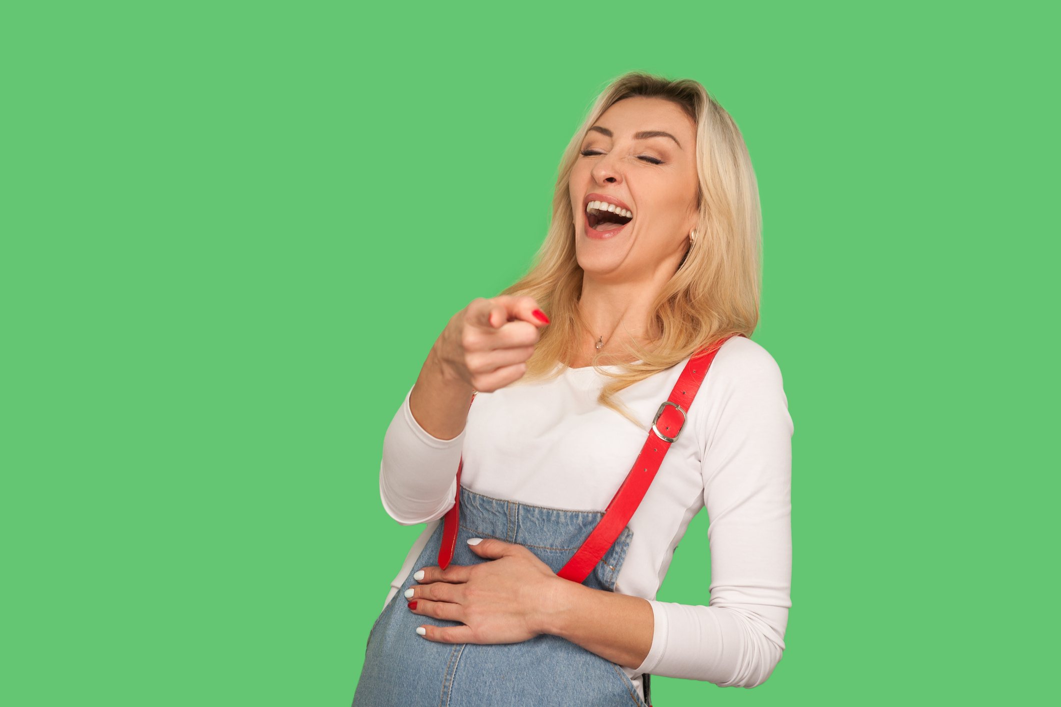 Ha ha ha, look at you! Portrait of adult woman bursting into laughing while watching someone really funny