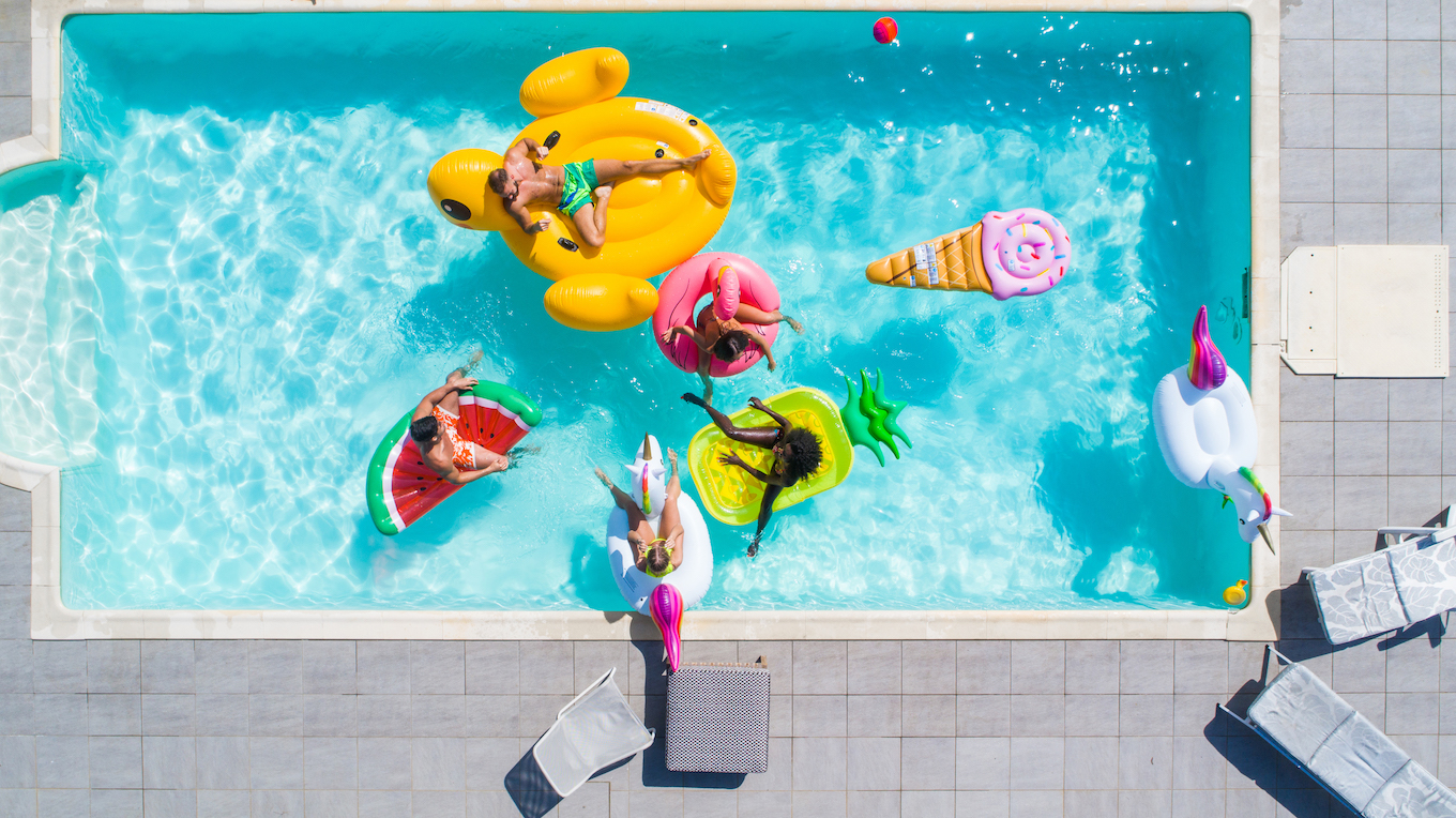 Friends having fun in a swimming pool