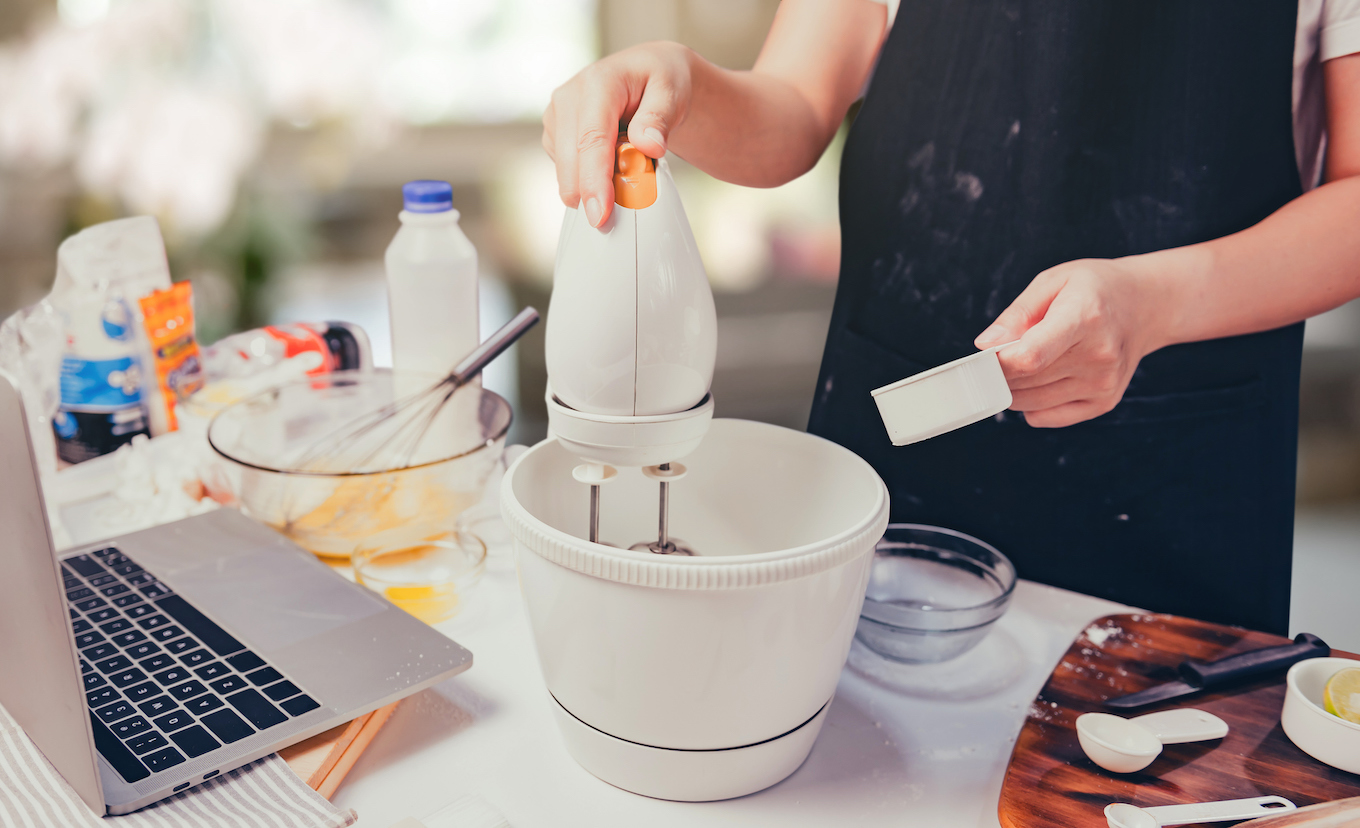 Home cooking by online learning for process of cookery homemade sweet dessert. Stay home and social connect concept. New normal and life after COVID-19.