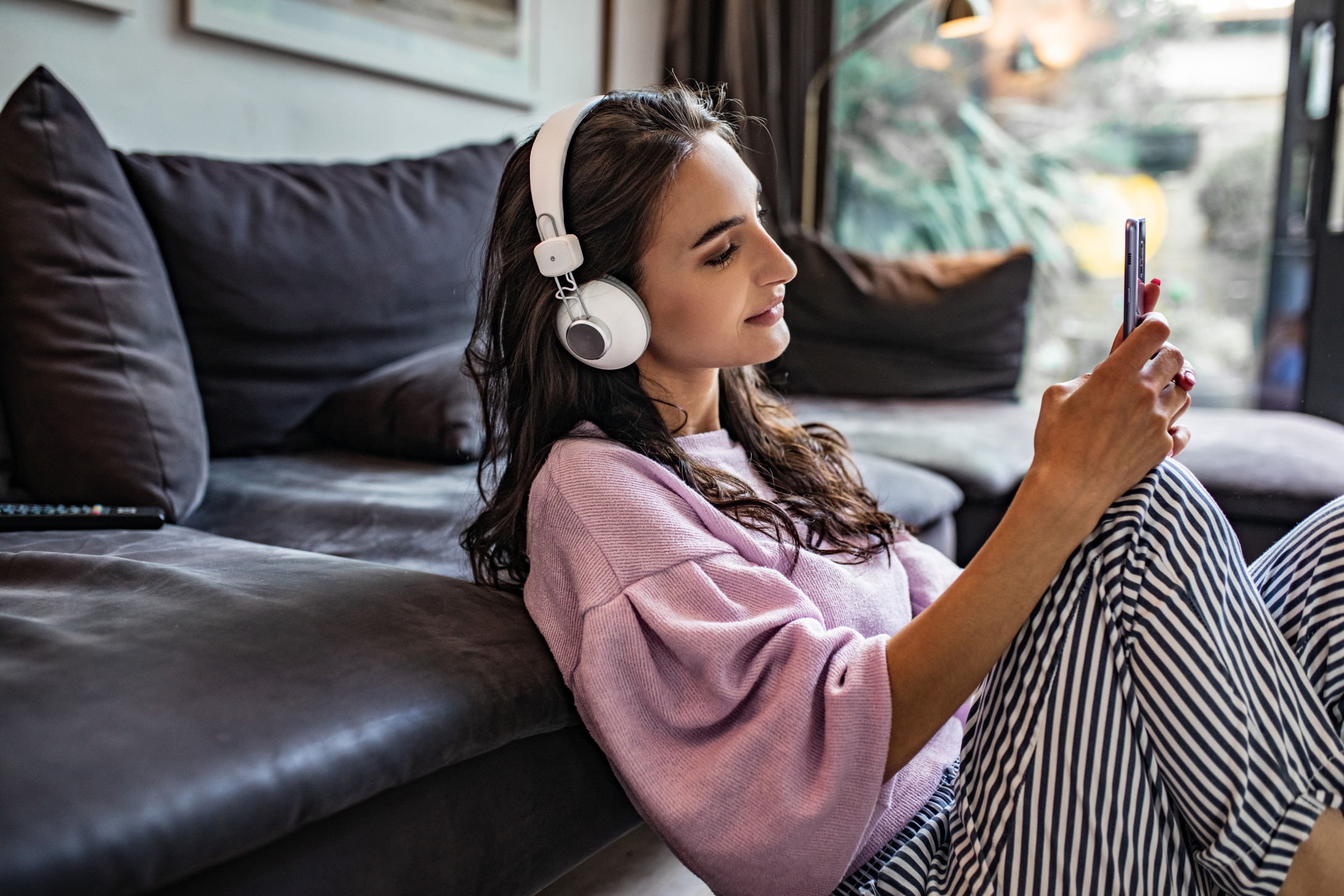 woman listening to a podcast