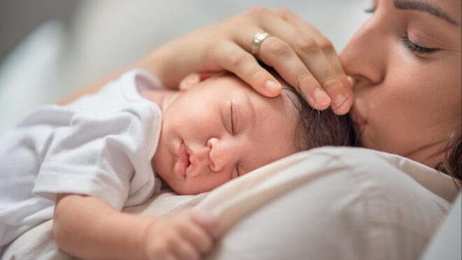 mom and new baby iStock-1287186696