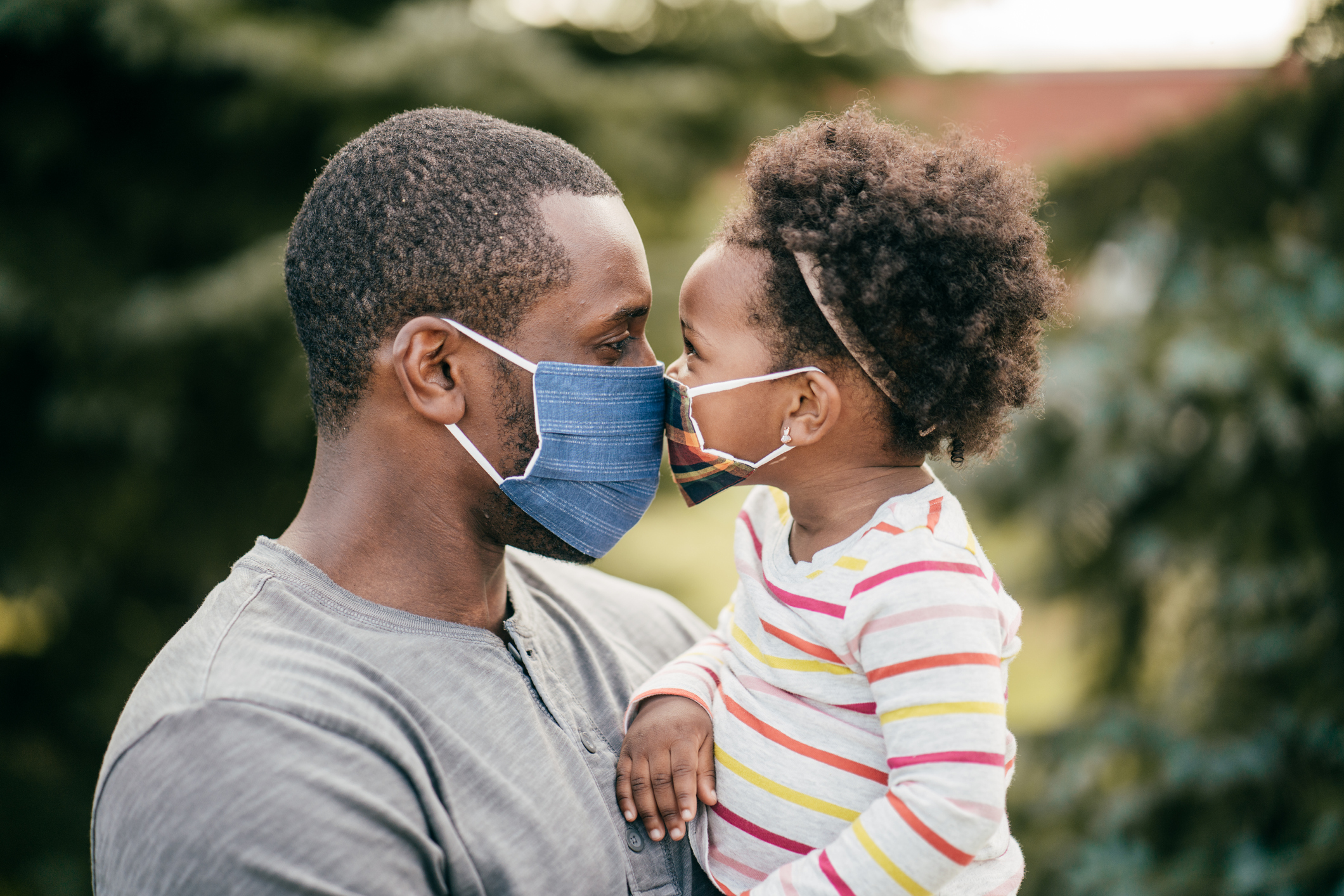 dad and daughter in mask