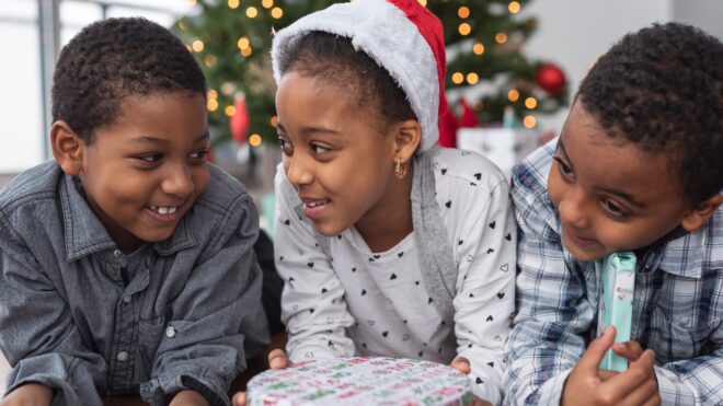 siblings happy at christmas