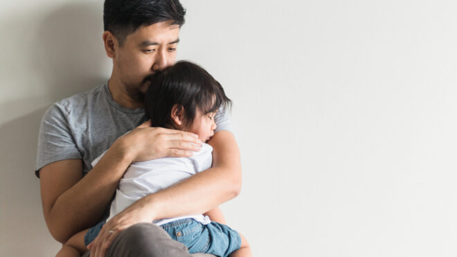 dad-holding-child
