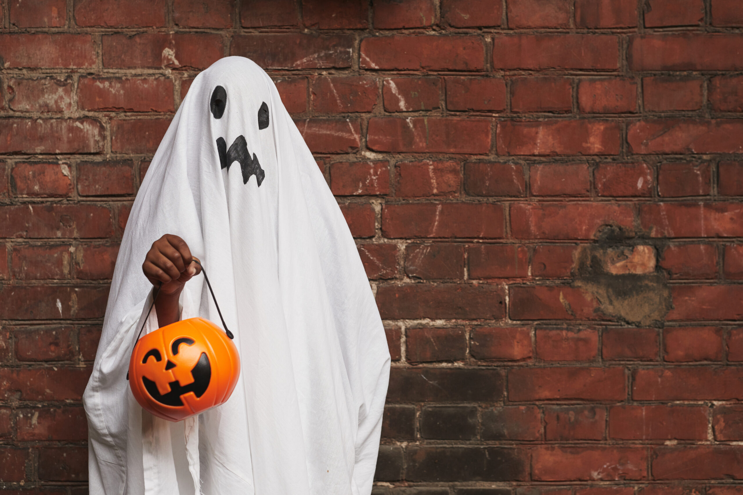 Kid Dressed Up As Ghost