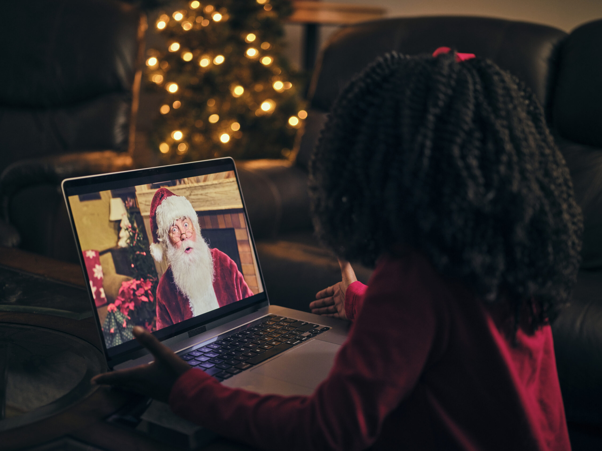 Little Girl Talking to Santa Claus on a Video Call