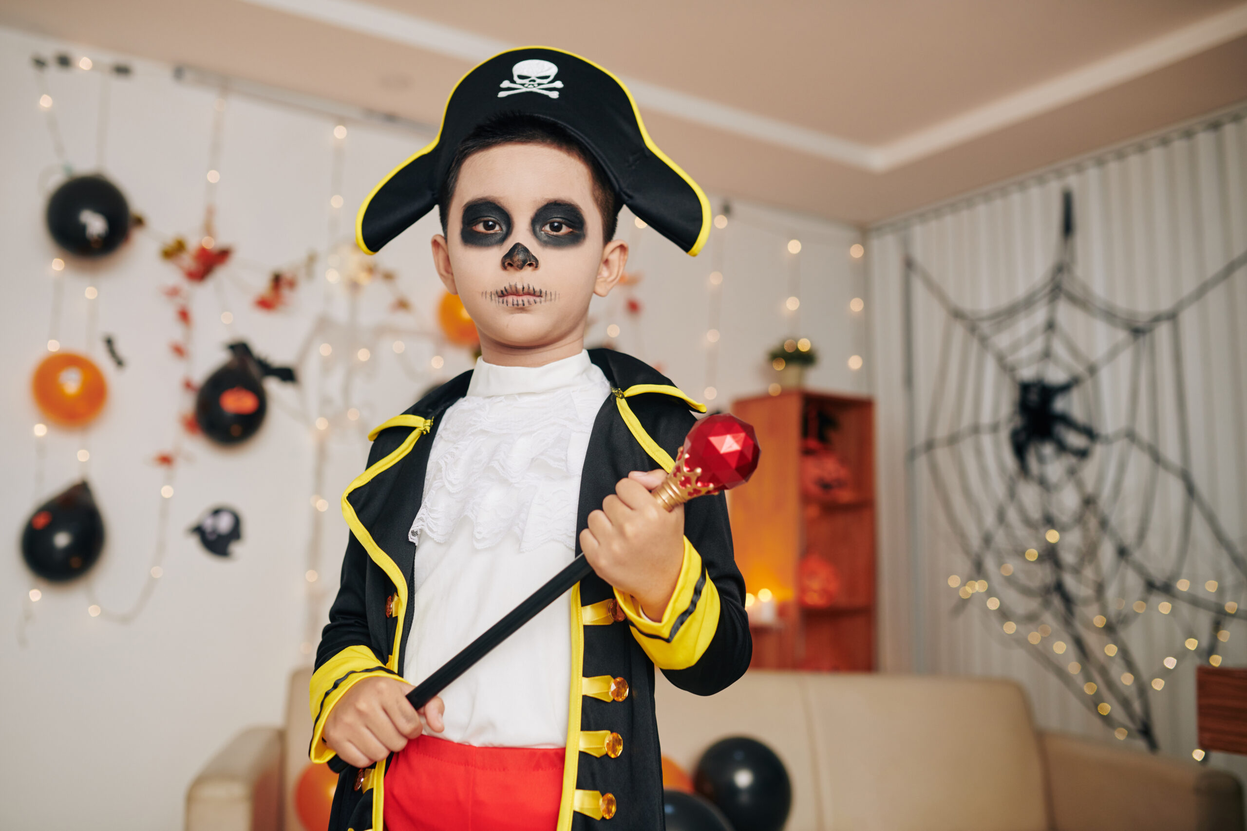 Serious boy at Halloween party